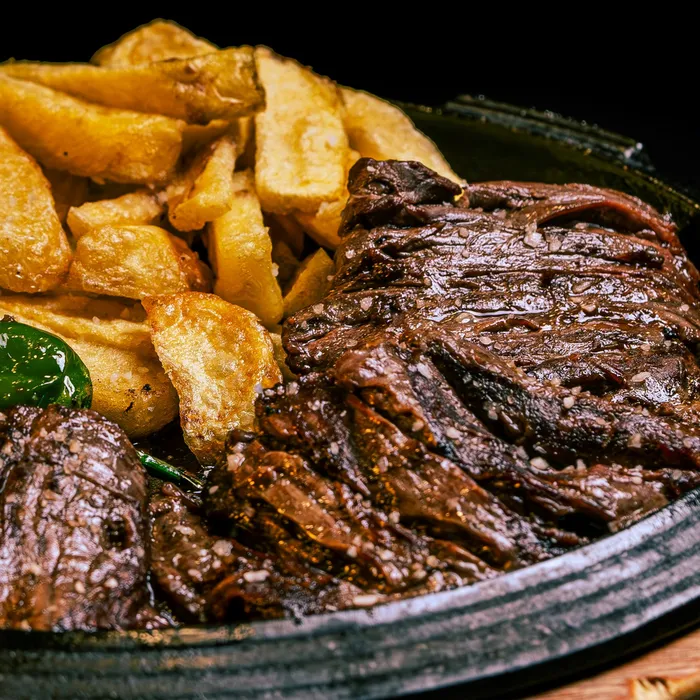 Churrasco con papas de Farah Plaza Duarte